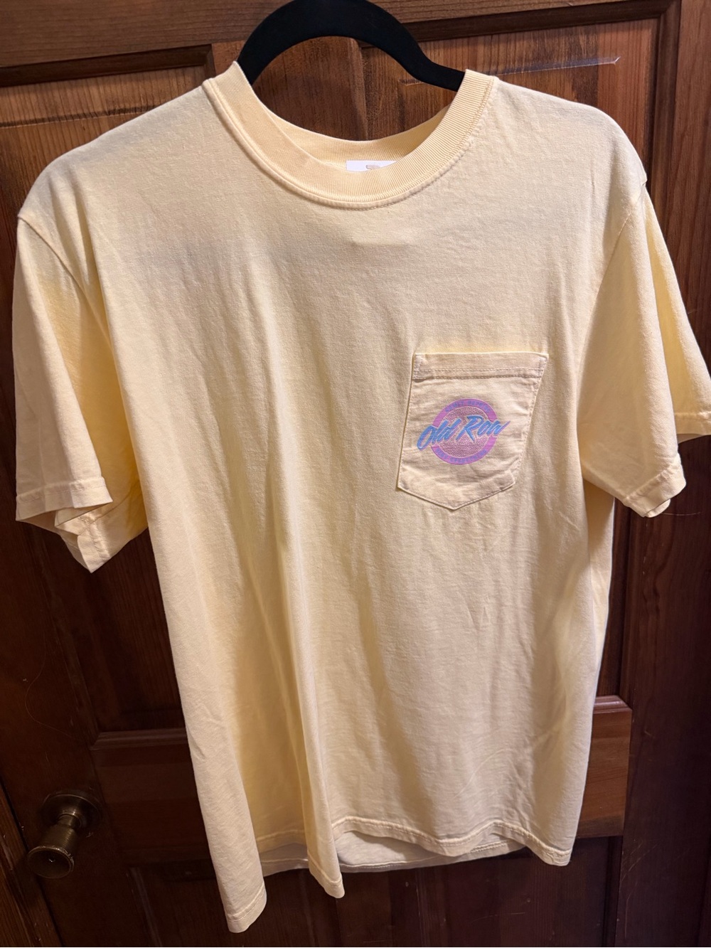 Women's Short Sleeve Pocket Tee in Pale Yellow with Retro Chest Print